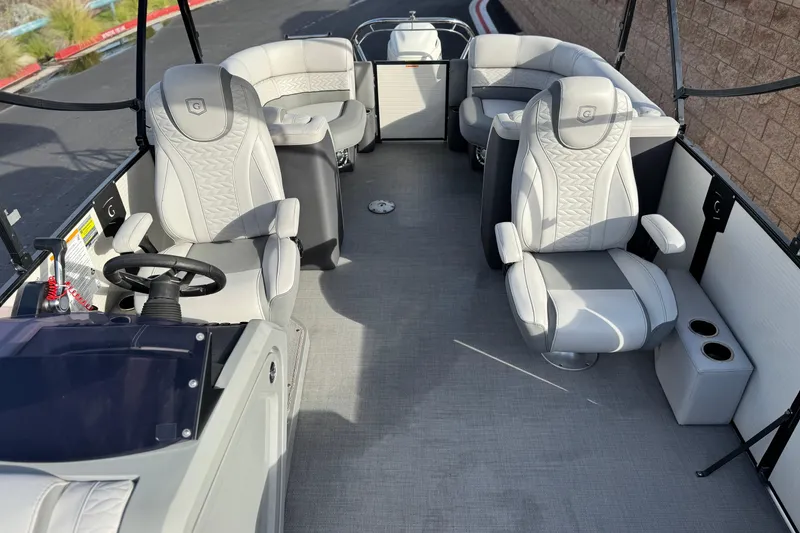 Slide: The Image of Luxurious interior of 2020 Godfrey Monacco 255 SD pontoon boat with plush seating. - 18
