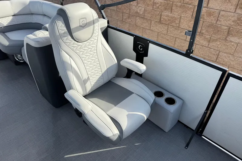 Slide: The Image of Luxurious seating on 2020 Godfrey Monacco 255 SD boat with cup holders. - 19