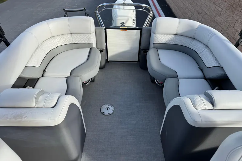 Slide: The Image of Luxurious seating on 2020 Godfrey Monacco 255 SD boat, featuring elegant gray upholstery. - 20