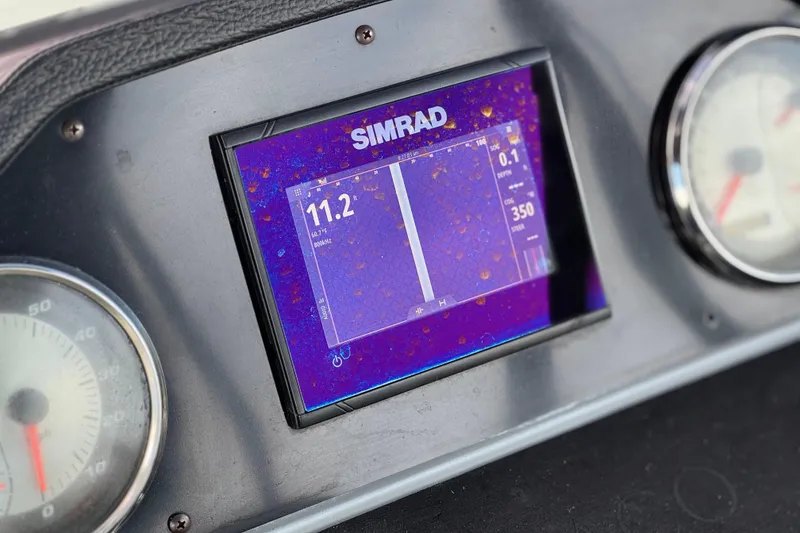 Slide: The Image of Dashboard of 2020 Godfrey Monacco 255 SD with Simrad display and gauges. - 29