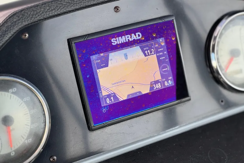 Slide: The Image of Simrad navigation display on 2020 Godfrey Monacco 255 SD boat dashboard. - 30