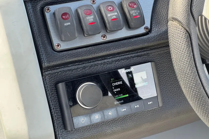 Slide: The Image of Control panel of 2020 Godfrey Monacco 255 SD with audio system and switches. - 31