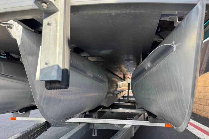Slide: The Image of Underneath view of a 2020 Godfrey Monacco 255 SD pontoon boat on a trailer. - 4