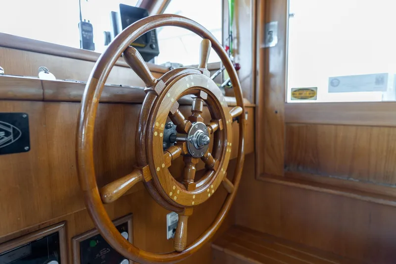 Slide: The Image of Wooden steering wheel of a 1991 Lien Hwa Cockpit Sundeck yacht. - 11
