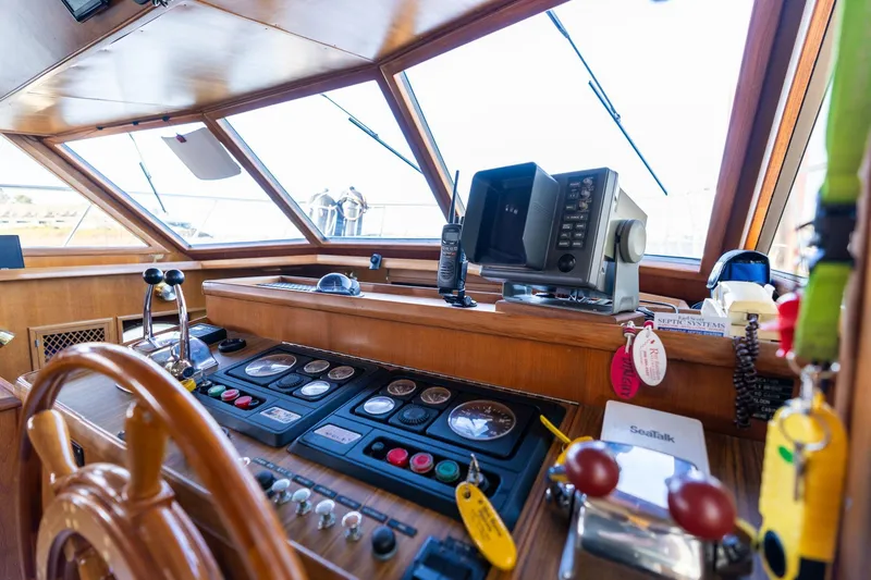 Slide: The Image of 1991 Lien Hwa Cockpit Sundeck yacht helm with navigation equipment and controls. - 12
