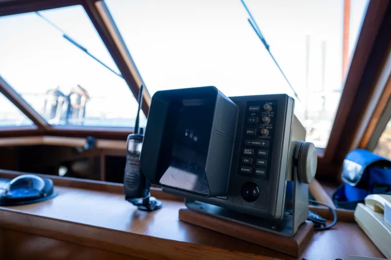 Slide: The Image of 1991 Lien Hwa Cockpit Sundeck interior with navigation equipment and radio. - 13