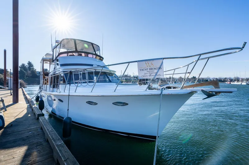 Slide: The Image of 1991 Lien Hwa Cockpit Sundeck yacht docked under bright sun. - 3