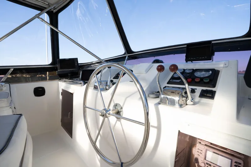 Slide: The Image of 1991 Lien Hwa Cockpit Sundeck helm with steering wheel and control panel. - 40