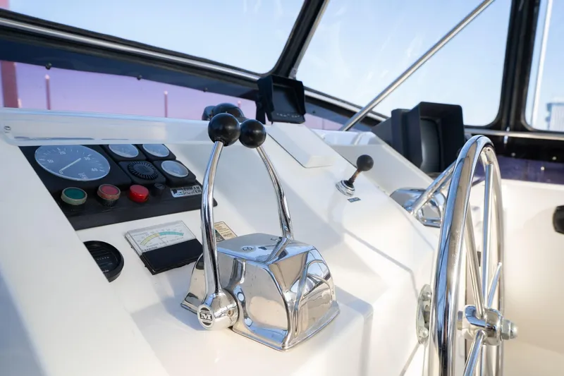 Slide: The Image of 1991 Lien Hwa Cockpit Sundeck helm with controls and steering wheel. - 41