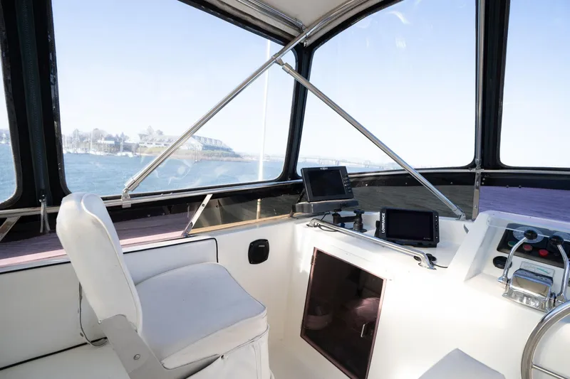 Slide: The Image of 1991 Lien Hwa Cockpit Sundeck interior with navigation equipment and panoramic windows. - 42