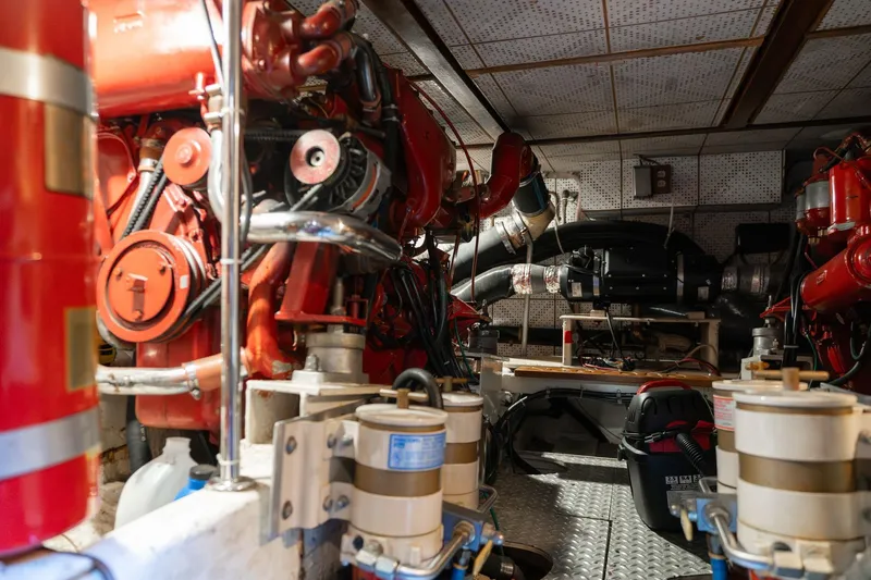 Slide: The Image of Engine room of 1991 Lien Hwa Cockpit Sundeck yacht with visible machinery and equipment. - 53