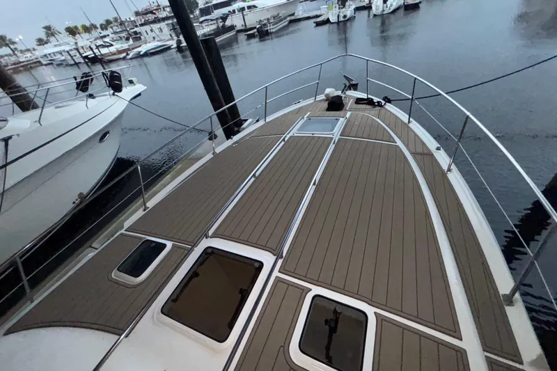 Slide: The Image of Bow view of 1995 Sea Ray Sundancer 370 docked at marina. - 10