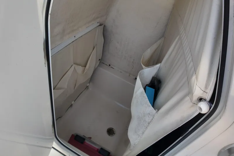 Slide: The Image of Interior storage compartment of 2020 Key West 219 FS boat, featuring side pockets. - 18