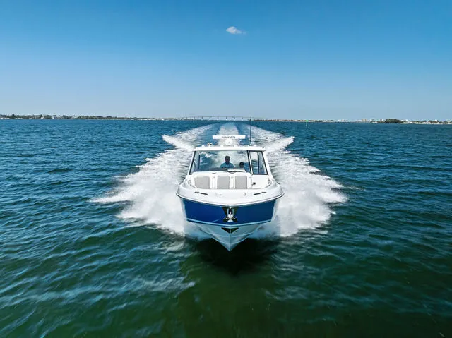 Slide: The Image of Stern area of a 2026 Everglades 367 CX boat with engine. - 25