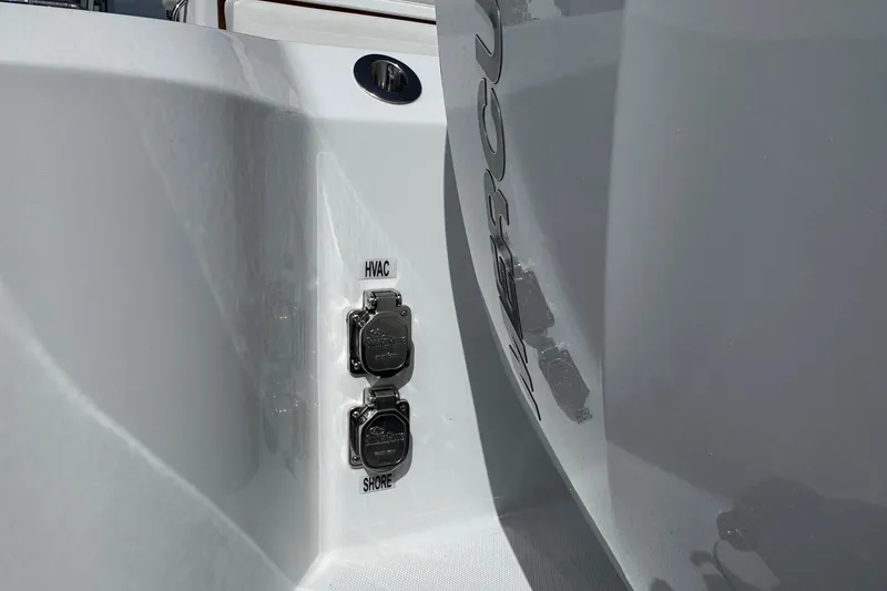 Slide: The Image of Everglades 367 CX 2026 boat with HVAC and shore power connections. - 29