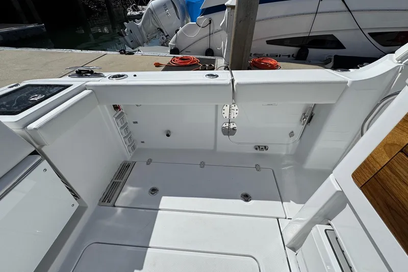 Slide: The Image of Interior of Everglades 367 CX boat, 2026 model, docked. - 34