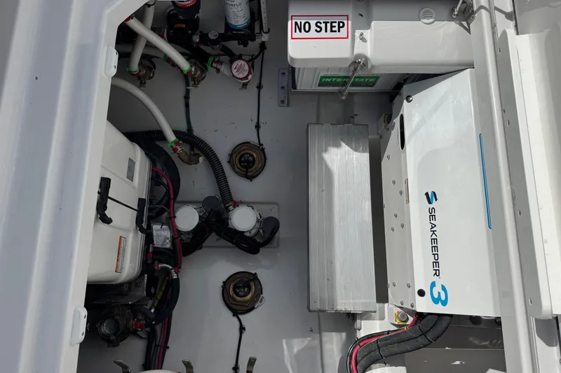 Slide: The Image of Interior view of 2026 Everglades 367 CX boat engine. - 40