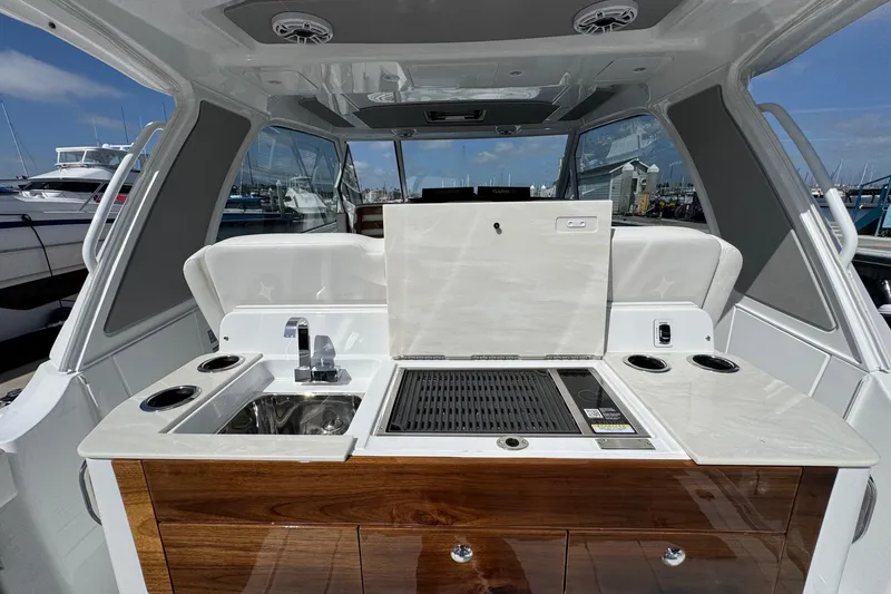 Slide: The Image of Luxury kitchen on Everglades 367 CX boat, model year 2026. - 47
