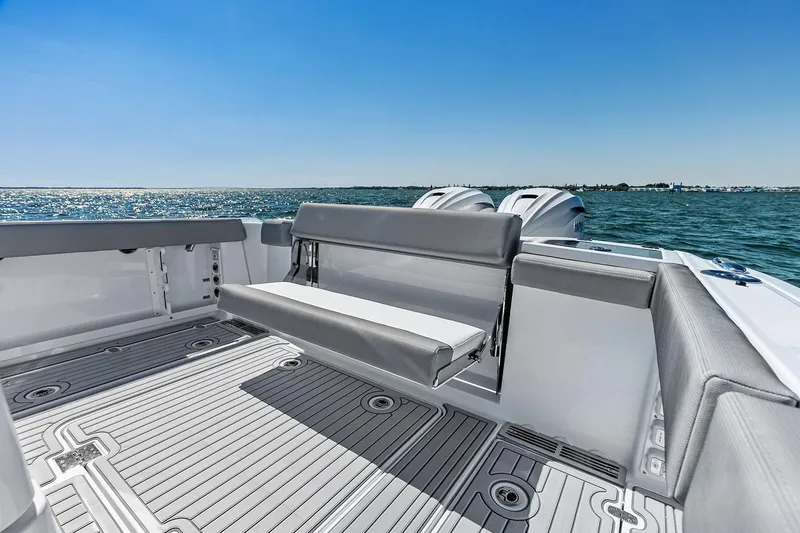 Slide: The Image of Manufacturer Provided Image: 2025 Everglades 367 CX boat with spacious seating, sleek design, and ocean view. - 8