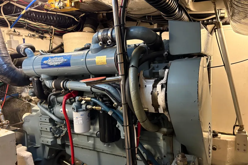 Slide: The Image of Engine room of a 1999 Tiara Yachts 4000 Express, featuring a Diamond Performance Series engine. - 17