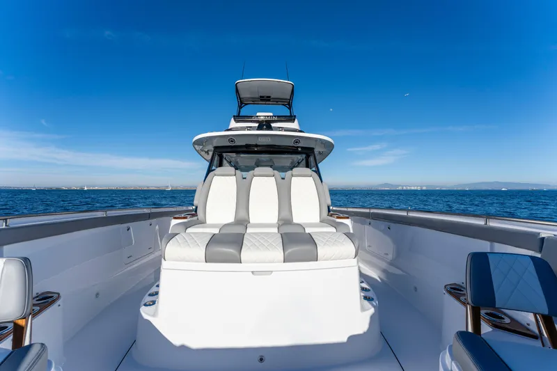Slide: The Image of Everglades 455 Center Console 2026 on open sea under clear sky. - 14