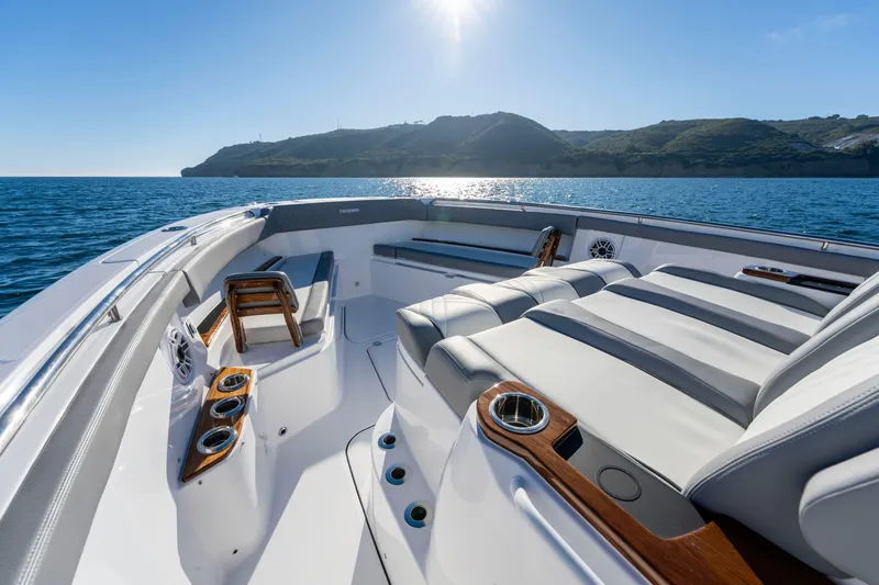 Slide: The Image of Luxurious Everglades 455 Center Console boat, 2026 model, on open sea. - 27