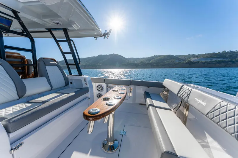 Slide: The Image of Luxurious interior of Everglades 455 Center Console 2026 on the water. - 31