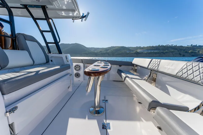 Slide: The Image of Interior of Everglades 455 Center Console 2026 on the water. - 32