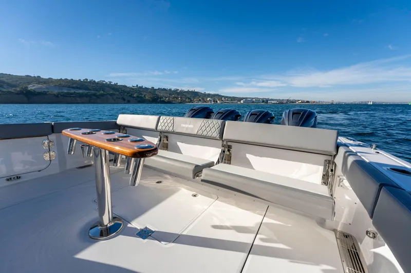 Slide: The Image of Everglades 455 Center Console 2026 on open water with seating area. - 33