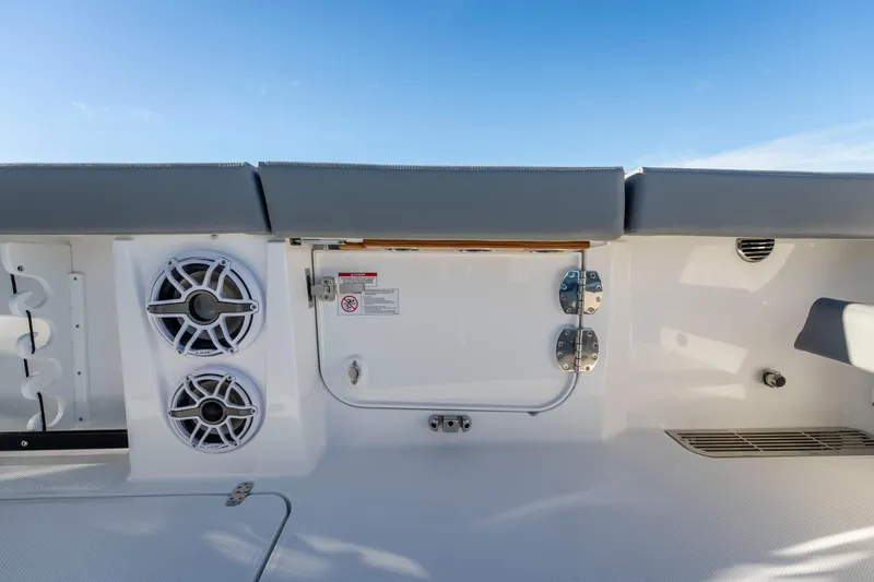 Slide: The Image of Everglades 455 Center Console 2026, speakers and seating area. - 42