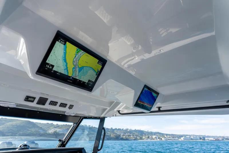 Slide: The Image of Navigation systems in Everglades 455 Center Console boat, year 2026. - 44