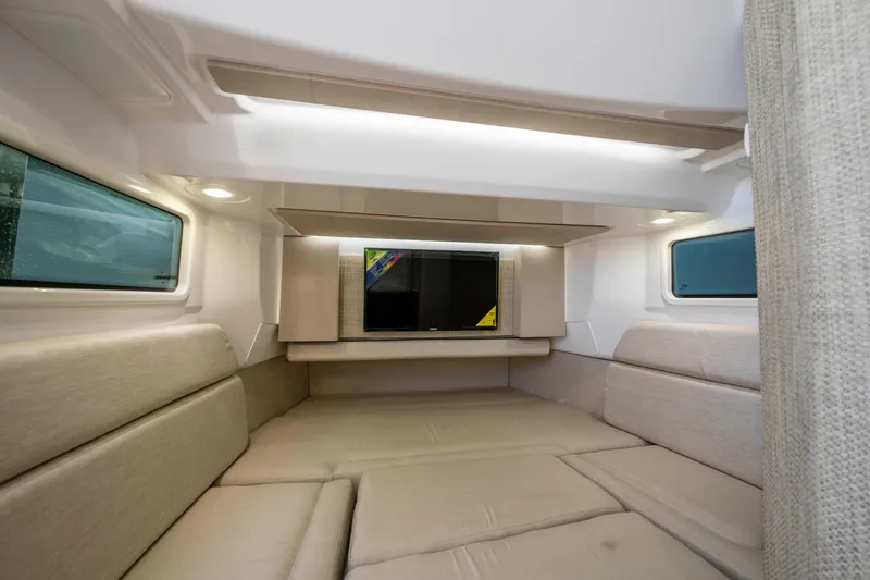Slide: The Image of Interior of Everglades 455 Center Console 2026 with cozy seating area. - 50