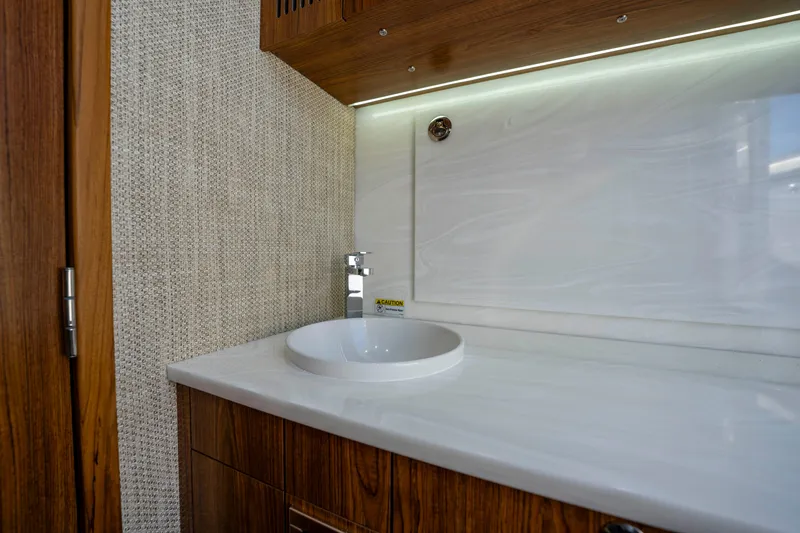 Slide: The Image of Luxurious bathroom in Everglades 455 Center Console boat, year 2026. - 52