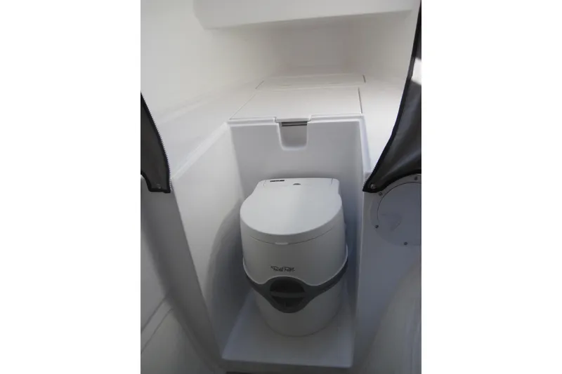 Slide: The Image of Compact marine toilet in 2022 Corsair 880 Standard sailboat interior. - 23