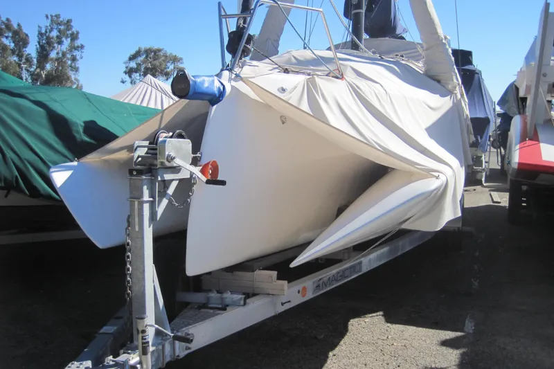 Slide: The Image of 2022 Corsair 880 Standard sailboat on trailer, covered and ready for transport. - 26