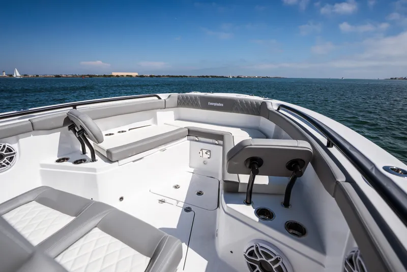Slide: The Image of 2025 Everglades 285 Center Console boat interior with seating, on open water. - 12