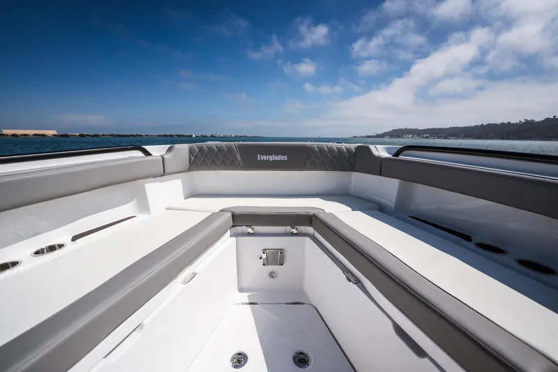 Slide: The Image of 2025 Everglades 285 Center Console boat interior with sleek seating and ocean view. - 13