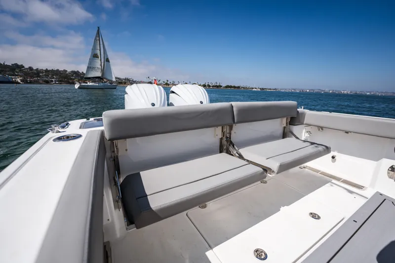 Slide: The Image of 2025 Everglades 285 Center Console boat with seating, on a sunny day at sea. - 19