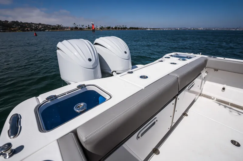 Slide: The Image of 2025 Everglades 285 Center Console boat with dual engines on open water. - 22