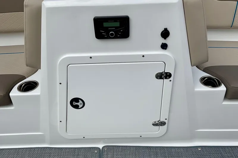 Slide: The Image of 2026 Tahoe 2150 boat interior with storage compartment and seating. - 15