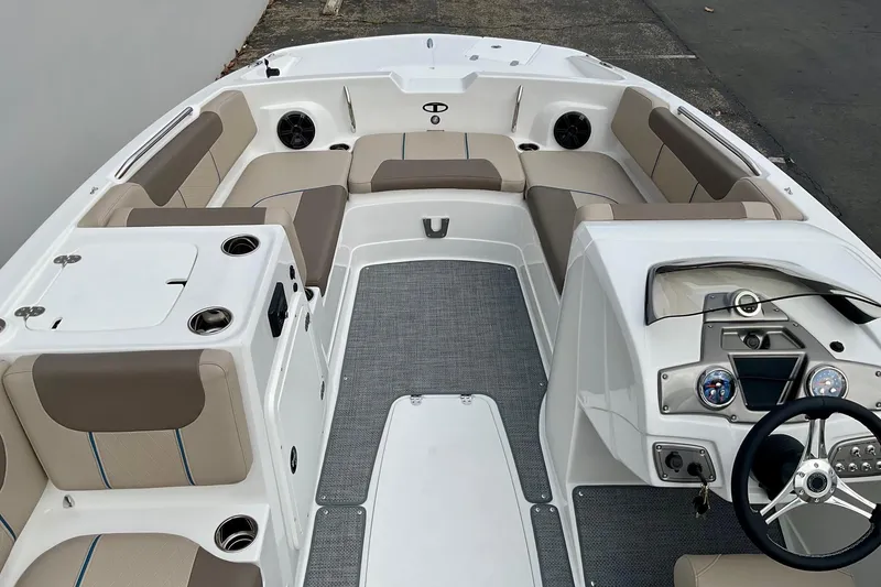 Slide: The Image of 2026 Tahoe 2150 boat interior with spacious seating and modern dashboard design. - 25