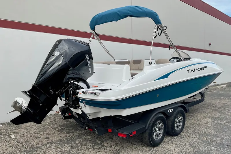 Slide: The Image of 2026 Tahoe 2150 boat with Mercury outboard engine on a trailer. - 5