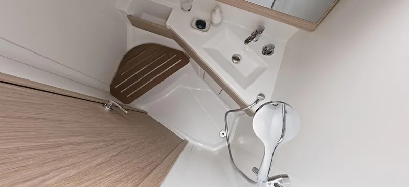 Slide: The Image of Modern kitchen interior of 2020 Beneteau Oceanis 46.1 yacht with stove and sink. - 17