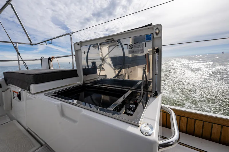 Slide: The Image of Beneteau Oceanis 46.1 yacht cockpit with open grill, ocean view, 2020 model. - 49