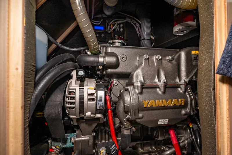 Slide: The Image of Engine compartment of 2020 Beneteau Oceanis 46.1 with Yanmar engine visible. - 57