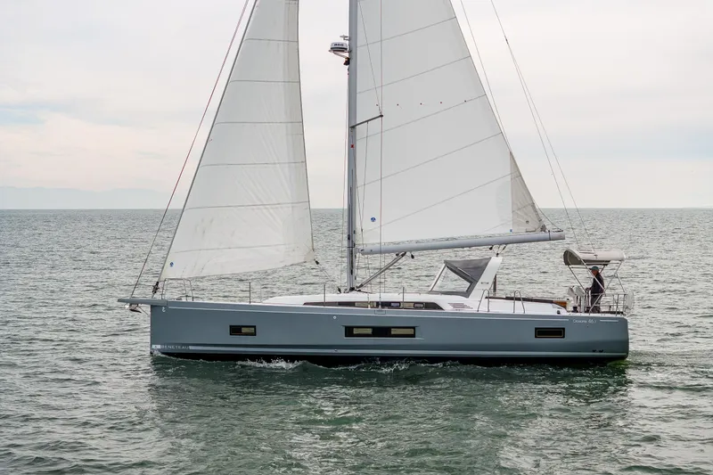 Slide: The Image of 2020 Beneteau Oceanis 46.1 sailing on open water with full sails. - 59