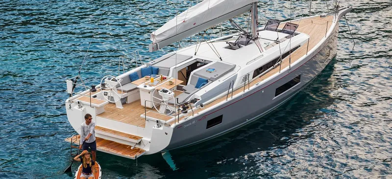 Slide: The Image of Cockpit of 2020 Beneteau Oceanis 46.1 with navigation equipment and steering wheel. - 6