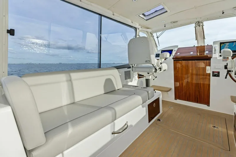 Slide: The Image of Interior of 2025 MJM 35 boat with seating and navigation equipment. - 20