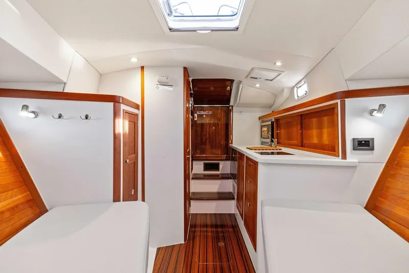 Slide: The Image of Luxurious interior of 2025 MJM 35 yacht with wood accents and modern amenities. - 4