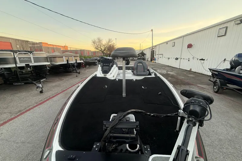 Slide: The Image of 2020 Nitro Z20 boat with Mercury engine on trailer by lakeside. - 18